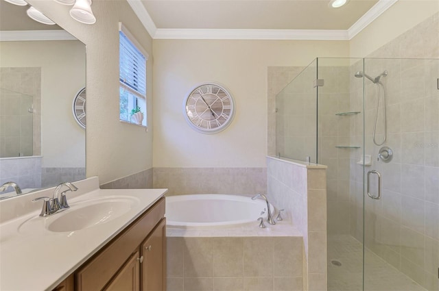 bathroom with vanity, crown molding, and independent shower and bath