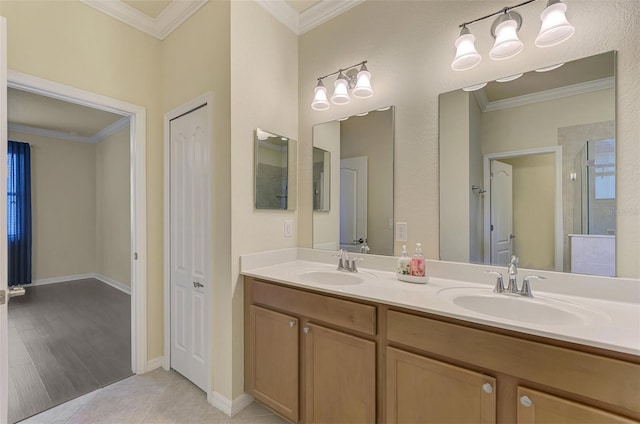 bathroom with walk in shower, ornamental molding, tile patterned floors, and vanity