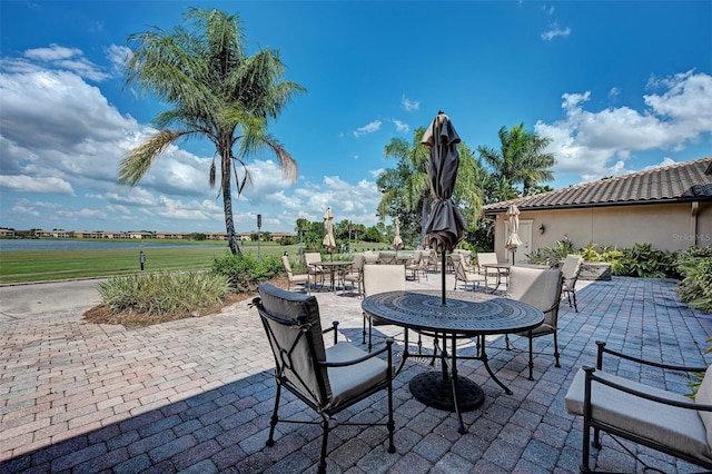 view of patio / terrace featuring a water view