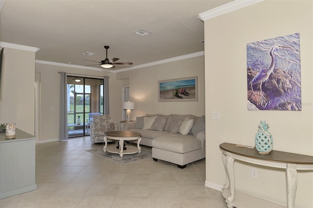 tiled living room with ceiling fan and ornamental molding