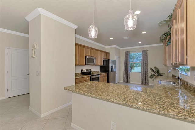 kitchen featuring sink, light stone countertops, kitchen peninsula, and appliances with stainless steel finishes