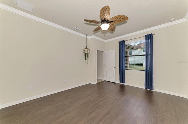 unfurnished room featuring dark hardwood / wood-style flooring, ornamental molding, and ceiling fan