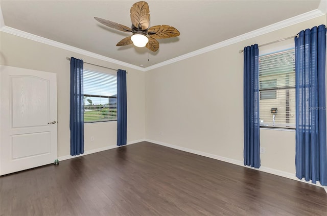 empty room featuring crown molding and dark wood-type flooring