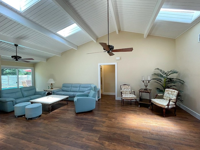 living room with vaulted ceiling with skylight, ceiling fan, and dark hardwood / wood-style flooring