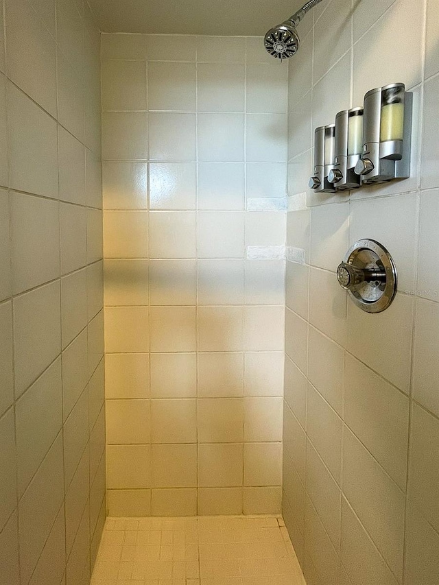 interior space with a tile shower