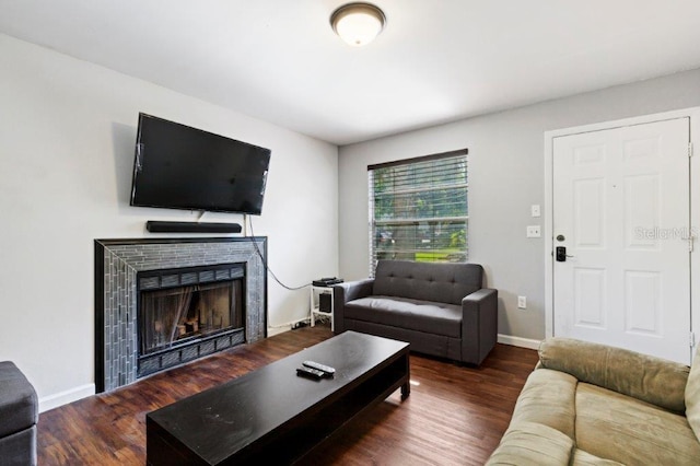 living room with dark wood-type flooring