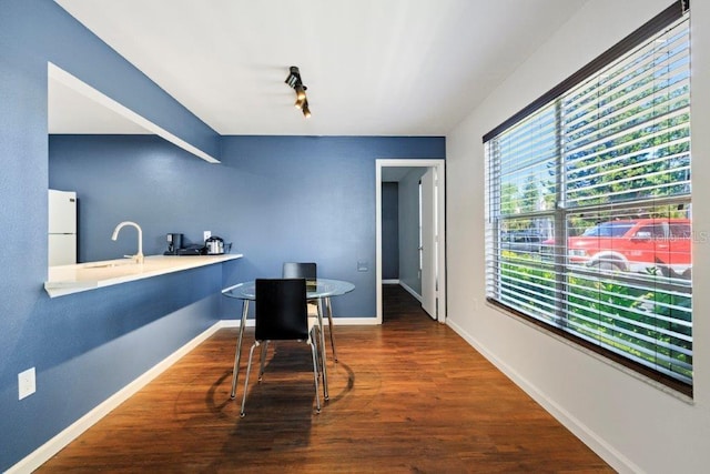 office space with sink and hardwood / wood-style flooring