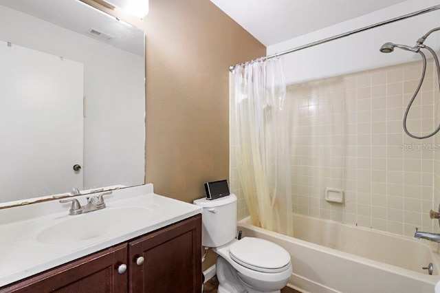 full bathroom featuring vanity, toilet, and shower / bathtub combination with curtain