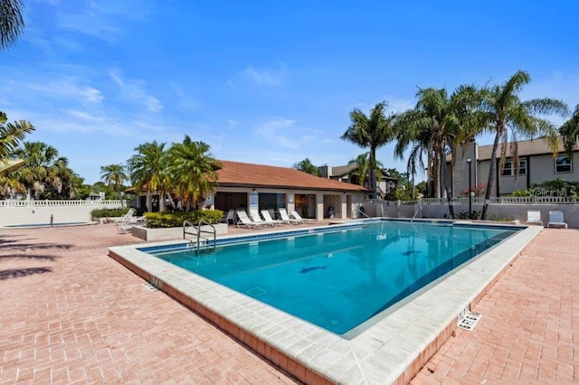 view of swimming pool featuring a patio