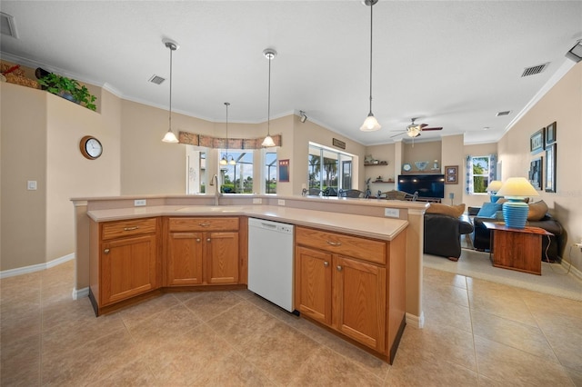 kitchen featuring ornamental molding, dishwasher, sink, and plenty of natural light