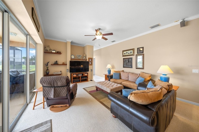 carpeted living room featuring crown molding and ceiling fan