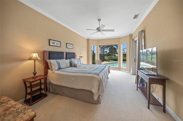 carpeted bedroom featuring ornamental molding, ceiling fan, and access to exterior