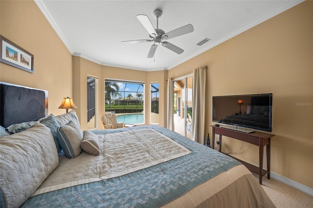 carpeted bedroom with ceiling fan, a textured ceiling, crown molding, and access to exterior