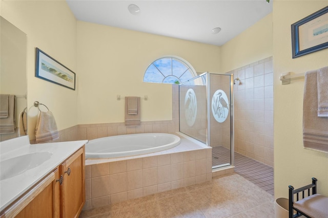 bathroom with vanity, separate shower and tub, and tile patterned floors