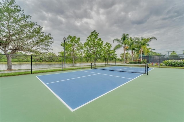 view of sport court featuring basketball hoop