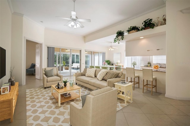 living room featuring light tile patterned floors and ornamental molding