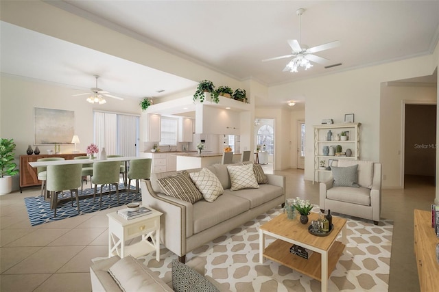 tiled living room featuring ceiling fan and crown molding