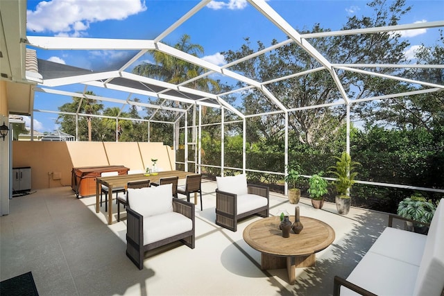 view of patio featuring an outdoor hangout area and a lanai