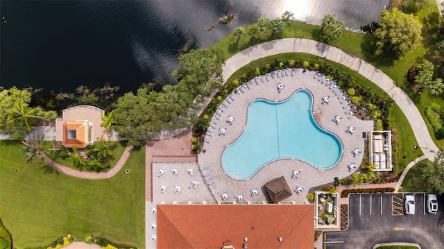 birds eye view of property featuring a water view