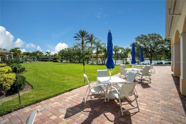 view of patio / terrace featuring a water view