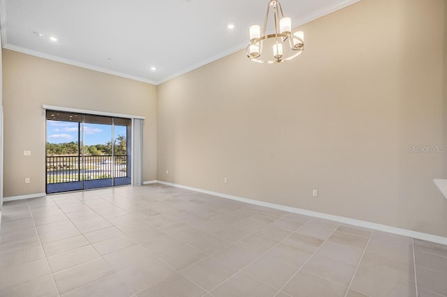 spare room with light tile patterned floors, crown molding, and a chandelier