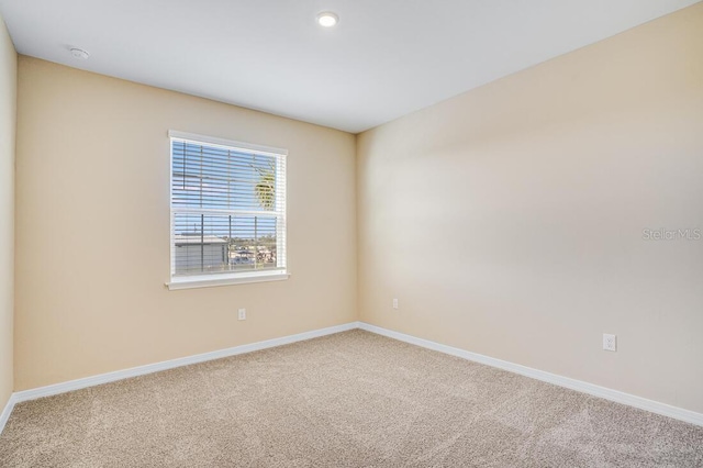 view of carpeted spare room