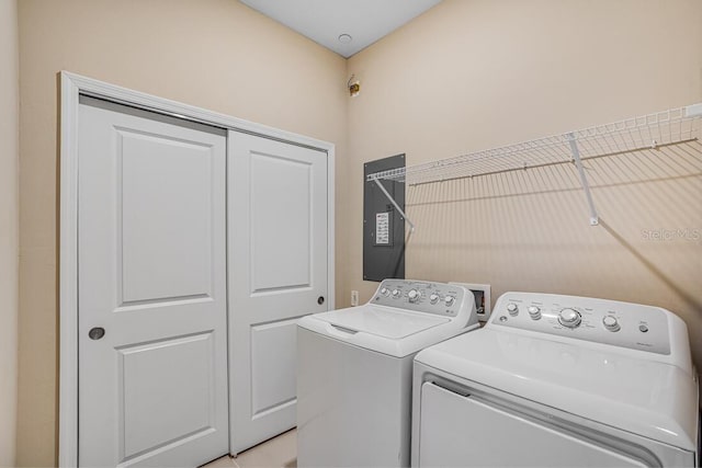 clothes washing area with independent washer and dryer