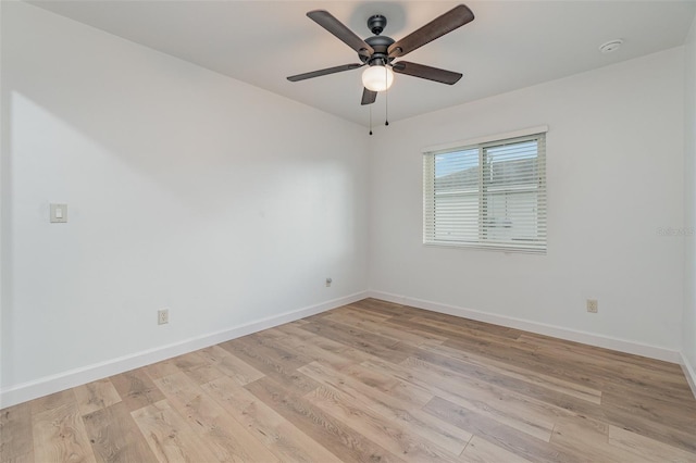 spare room with ceiling fan and light hardwood / wood-style floors