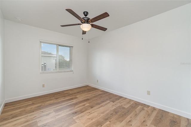 unfurnished room with light wood-type flooring and ceiling fan