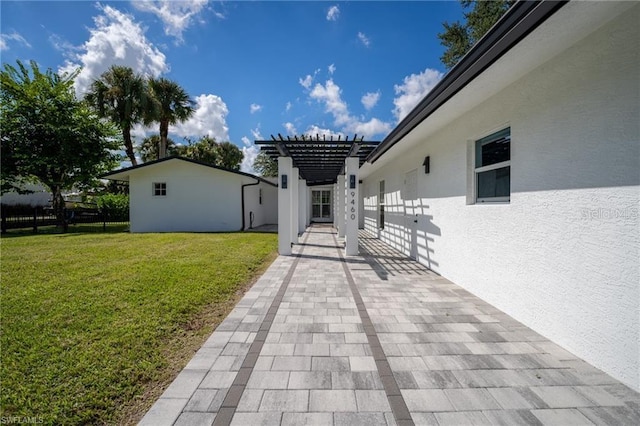 exterior space featuring a pergola and a patio area