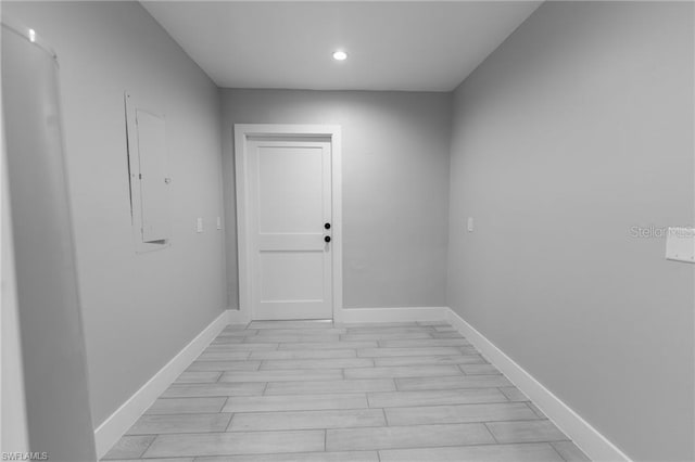 laundry room with light hardwood / wood-style flooring