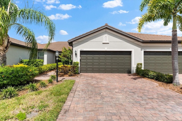 ranch-style house featuring a garage