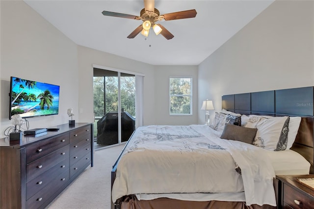 carpeted bedroom with access to exterior and ceiling fan