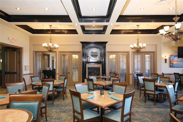 dining space featuring beamed ceiling, french doors, a towering ceiling, and coffered ceiling