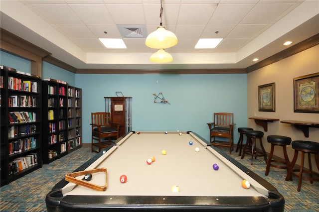 recreation room with carpet, a tray ceiling, and billiards