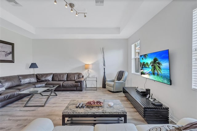 living room with light hardwood / wood-style flooring