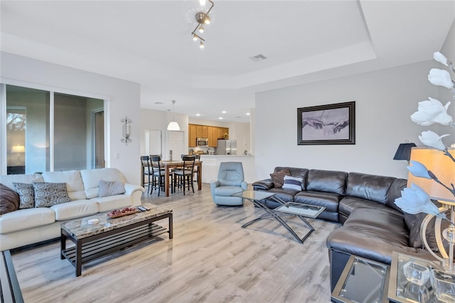 living room featuring light wood-type flooring