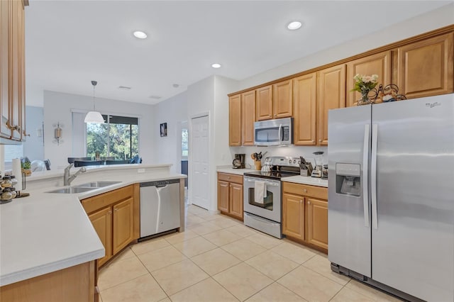 kitchen with light tile patterned floors, stainless steel appliances, hanging light fixtures, and sink