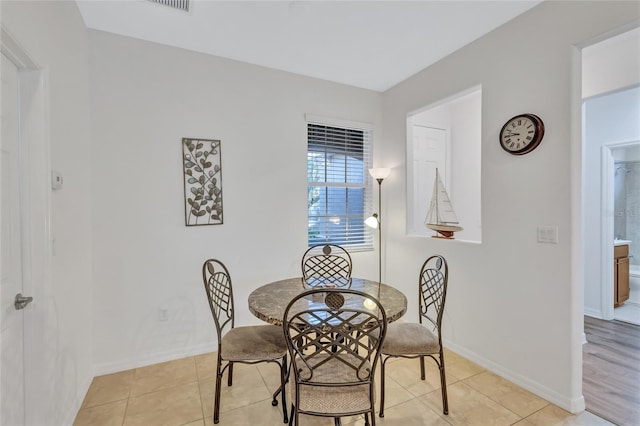 view of tiled dining room