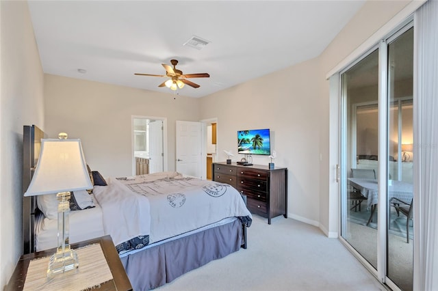 bedroom featuring light carpet, connected bathroom, access to outside, and ceiling fan