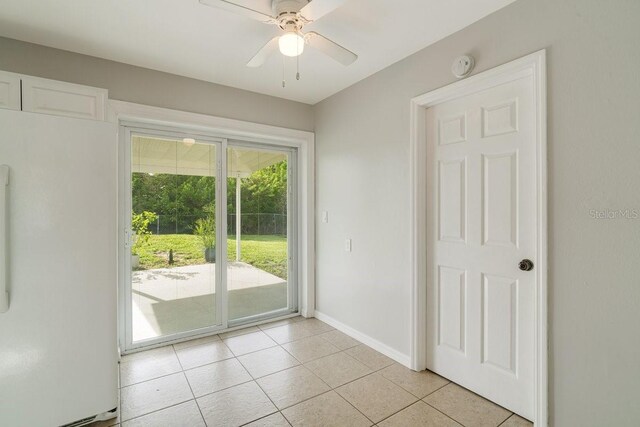 interior space featuring ceiling fan