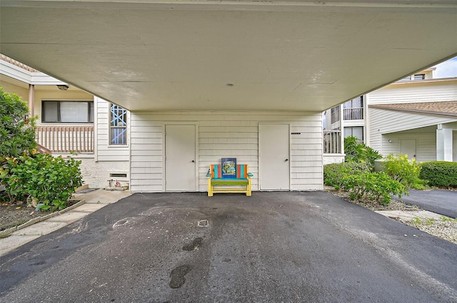 1026 Bird Bay Way Unit 276, Venice, FL 34285 - view of patio featuring an attached carport