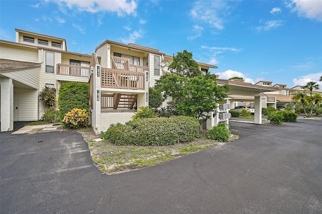 1026 Bird Bay Way Unit 276, Venice, FL 34285 - view of building exterior with stairs and a residential view
