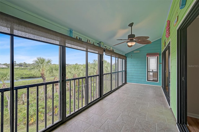 1026 Bird Bay Way Unit 276, Venice, FL 34285 - unfurnished sunroom featuring lofted ceiling and a water view