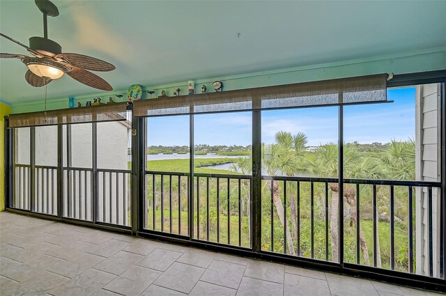 1026 Bird Bay Way Unit 276, Venice, FL 34285 - unfurnished sunroom with a water view