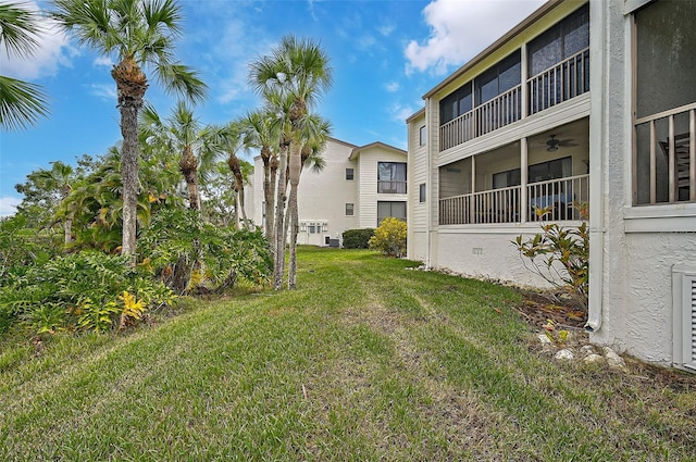 1026 Bird Bay Way Unit 276, Venice, FL 34285 - view of green lawn featuring ceiling fan