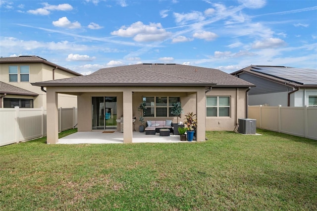 back of house featuring cooling unit, an outdoor hangout area, a lawn, and a patio area