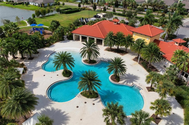 view of swimming pool with a patio