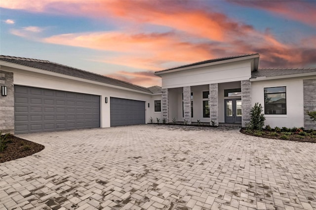 prairie-style home with a garage