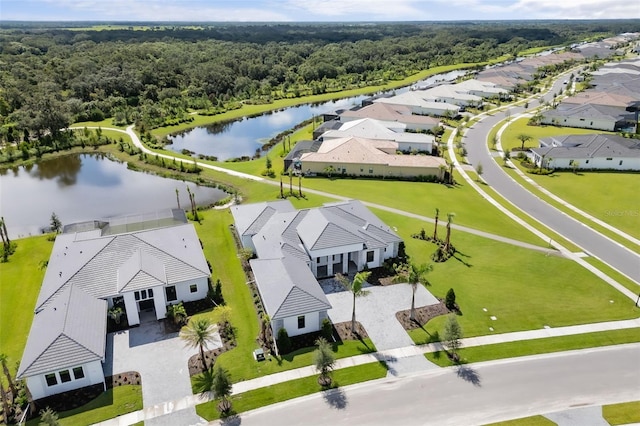 birds eye view of property featuring a water view